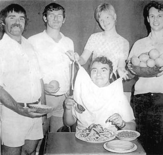 Noted trencher-man and transmitter technician George Allan has his on-duty meal delivered to FPQ-6. Serving him (left to right) are Frank Vinton, Colin Forbes, Nola Meiklejohn, and Geoff Goddard. Photo - George Allan