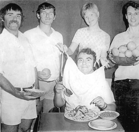 Noted trencher-man and transmitter technician George Allan has his on-duty meal delivered to FPQ-6. Serving hime from left to right are Frank Vinton, Colin Forbes, Nola Meiklejohn, and Geoff Goddard. Photo - George Allan